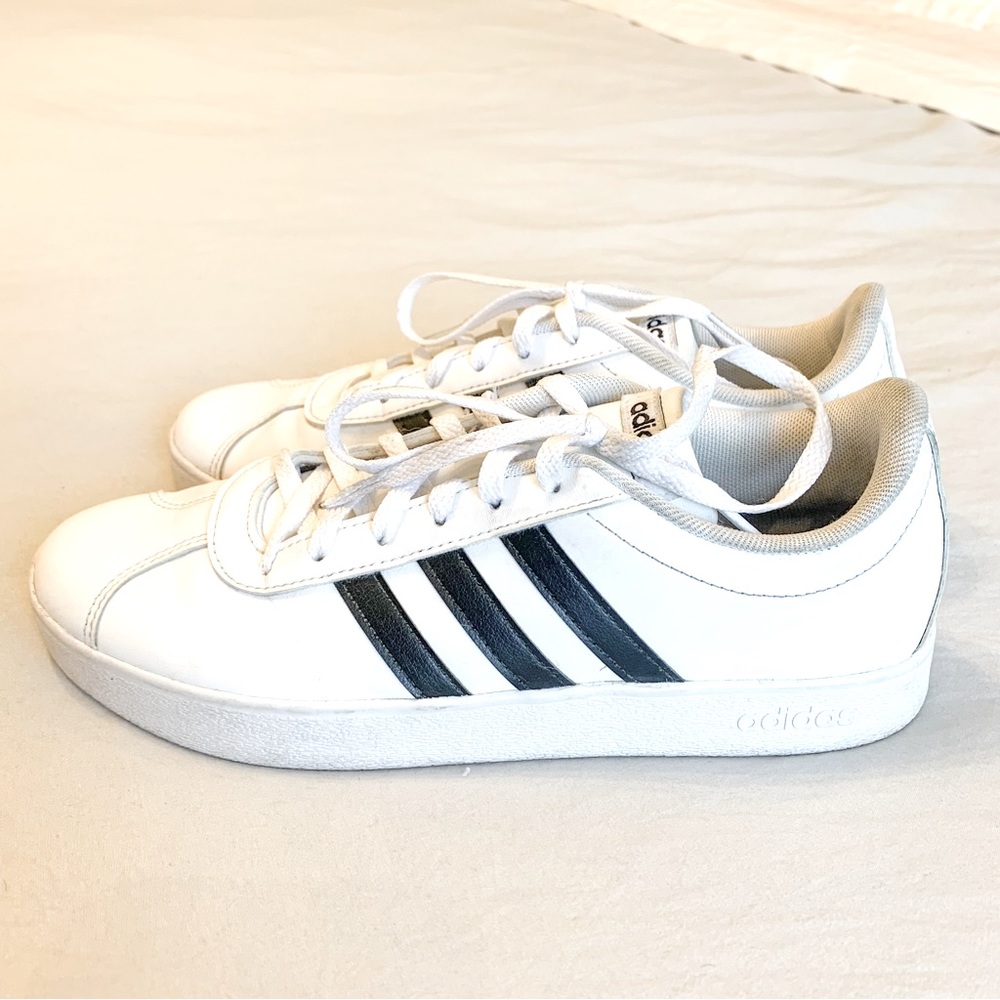 Classic Adidas sneakers.  Leather uppers.  EUC. Size Men’s 6, Women’s 7.